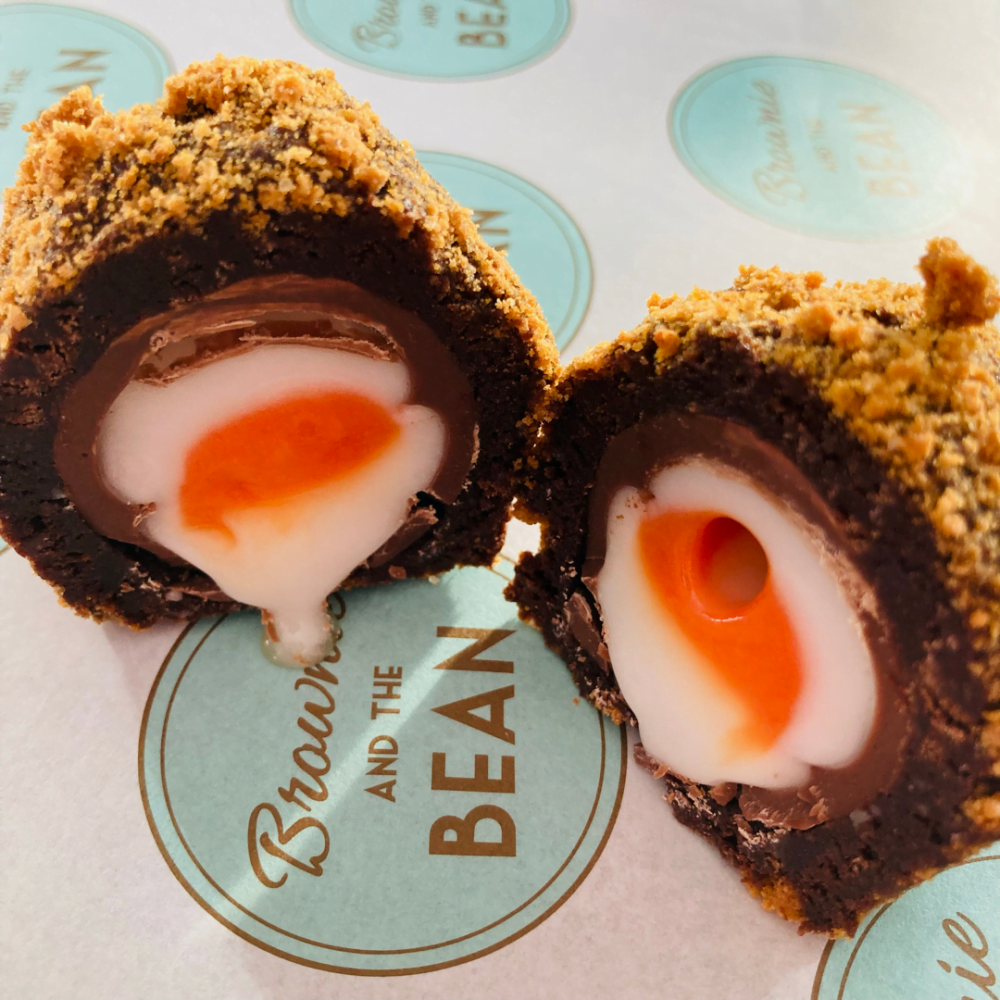 Scotch Egg Brownie on a branded greaseproof background.