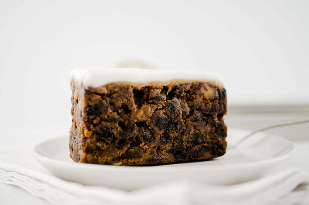 Close up of a slice of Christmas Cake on a plate
