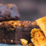 Brownies stacked with honeycomb stacked to the right hand side.