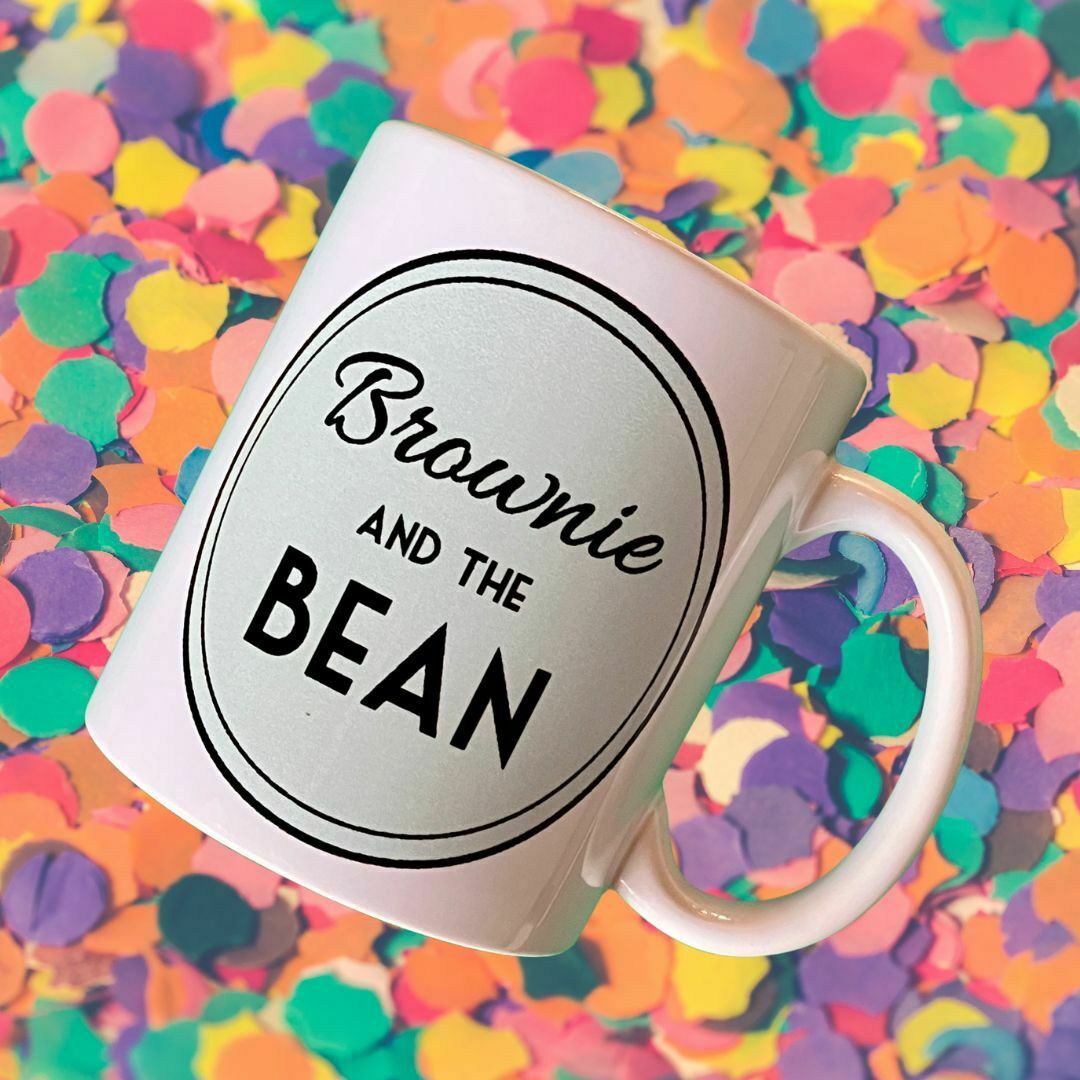 Features brownie and the bean mug on a bright coloured confetti background. The brownie and the bean mug forms as part of a free brownie gift box.