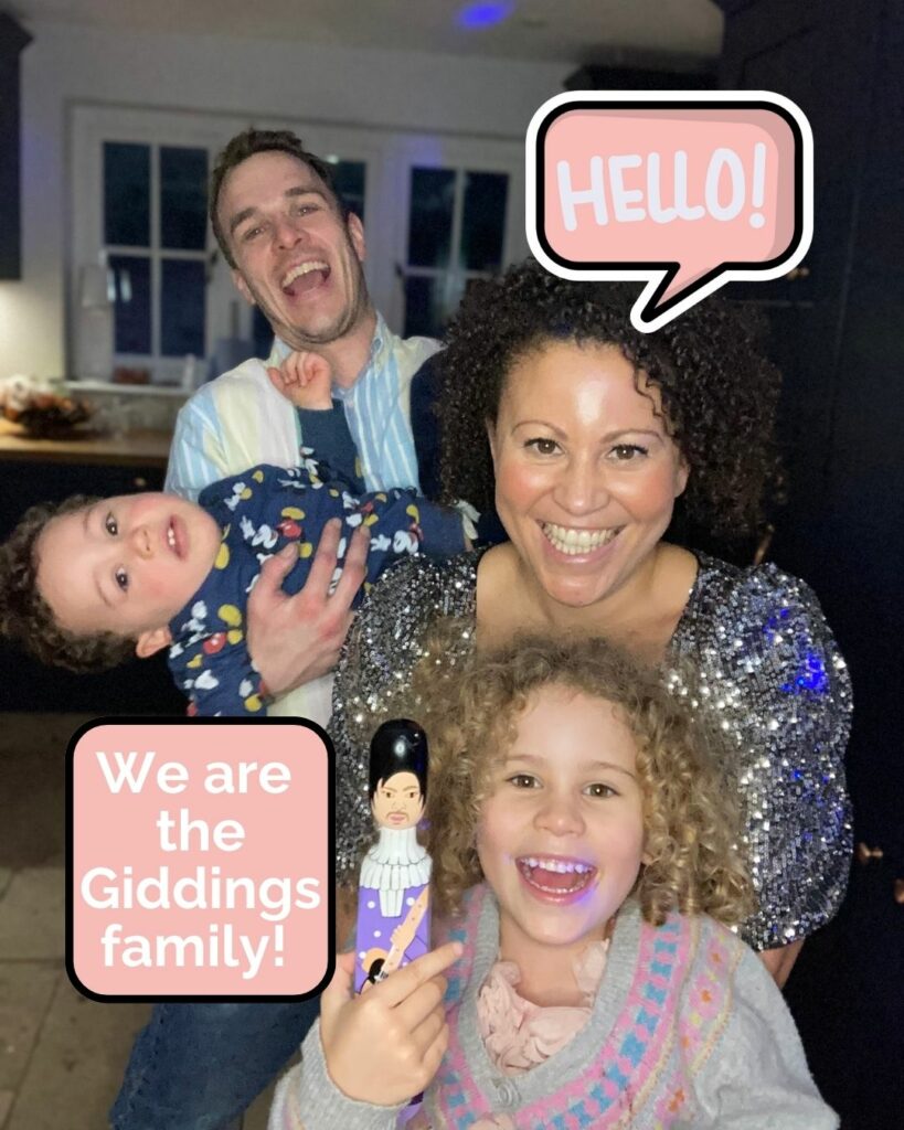 A family of four are in a photo looking really happy. In the top right there's a pink speech bubble saying "HELLO!". On the bottom right there's text saying "we are the Giddings family". There is a little blonde haired curly girl in the front, her mother is behind with a sparkly dress and dark curly hair. To the left is the husband with dark hair and a light pastel coloured shirt and he is carrying their son, who is lying down, wearing a Mickey Mouse outfit.